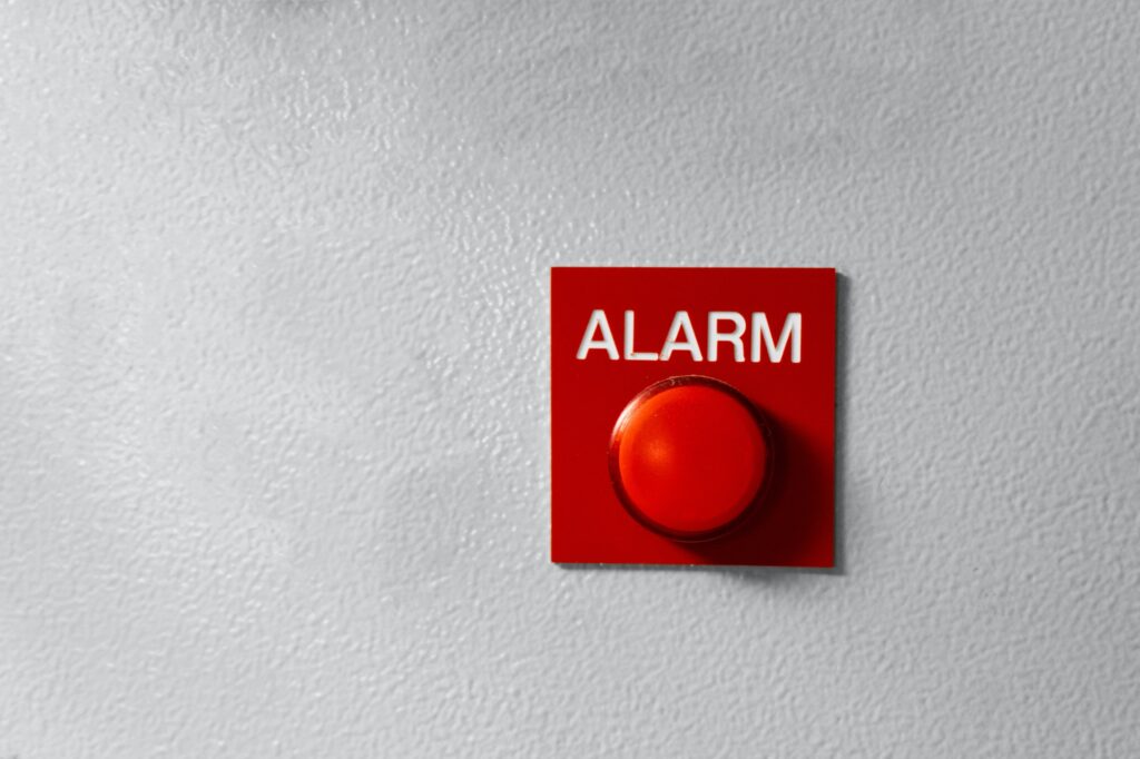 Red Alarm button on the wall